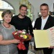 WKO Obmann Klaus Köpplinger und Stadtrat Alexander Petznek gratulieren Fotografie Pschill zum 10 jährigen Jubiläum